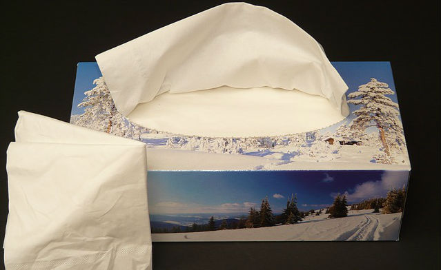 A box of Kleenex tissue paper with an outdoor winter print