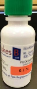 A bottle of stokes healthcare pilocarpine 0.1% ophthalmic solution