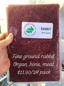 A bag of frozen ground rabbit by Thogersen Family Farms