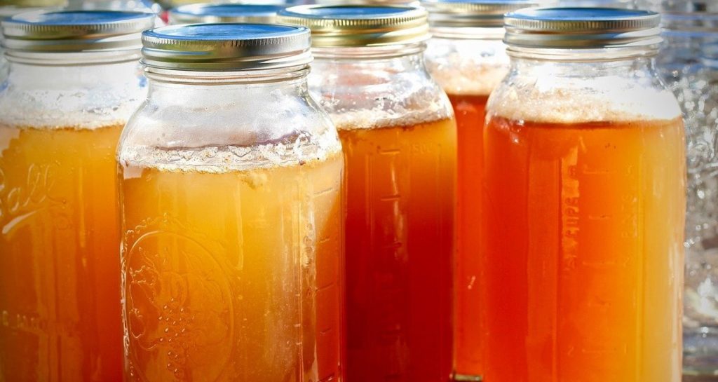 Mason jars of homemade apple cider