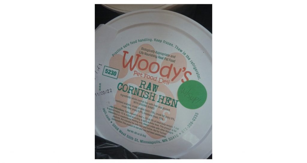 Woody’s Pet Food Deli Raw Cornish Hen Pet Food with supplements container lid